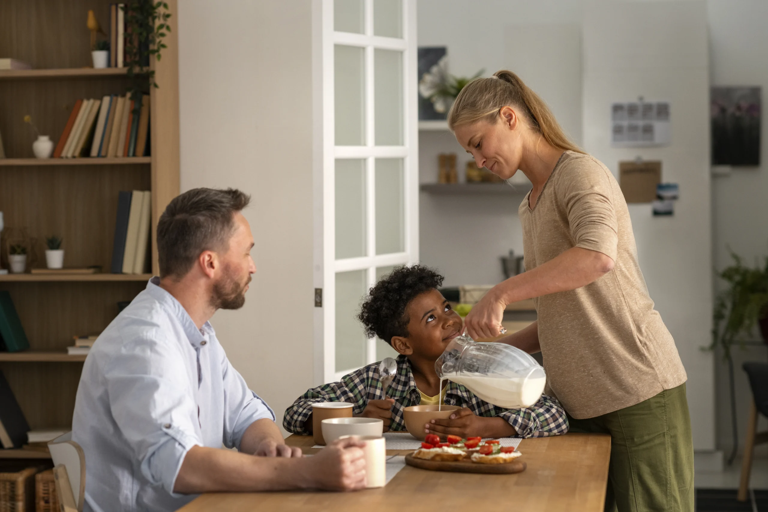 "Cyberbullying and mental health harm awareness as parents support child during family time at home"